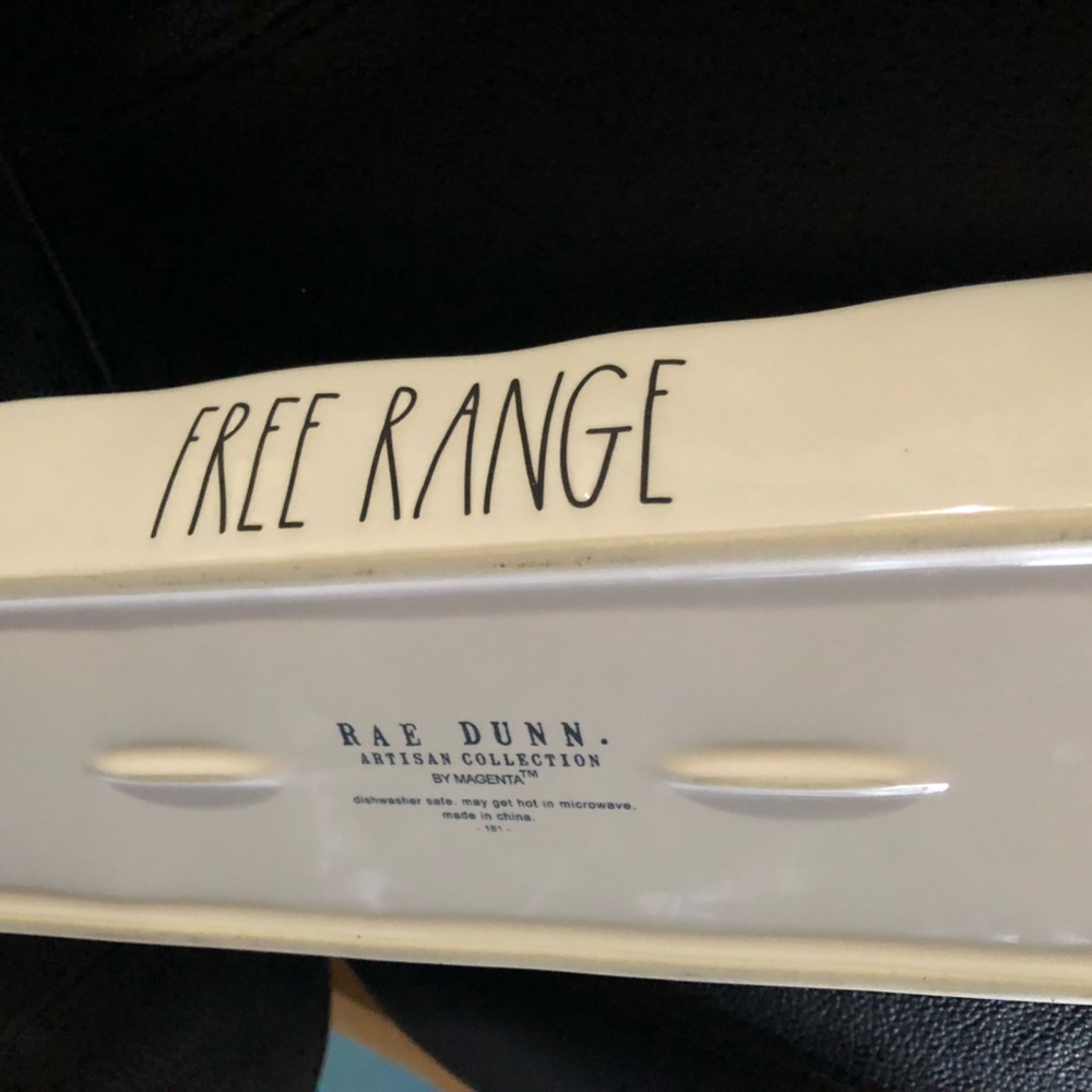 Egg tray. White w/black letters. No cracks or chips. I Used for display only.